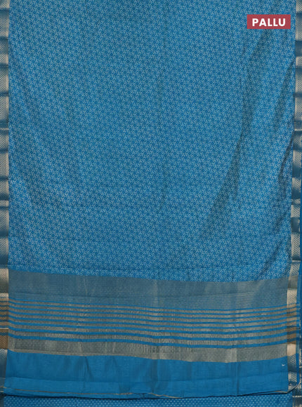 Semi raw silk saree teal blue with allover geometric prints and zari woven border
