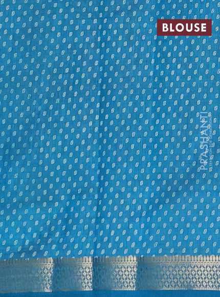 Semi raw silk saree teal blue with allover geometric prints and zari woven border