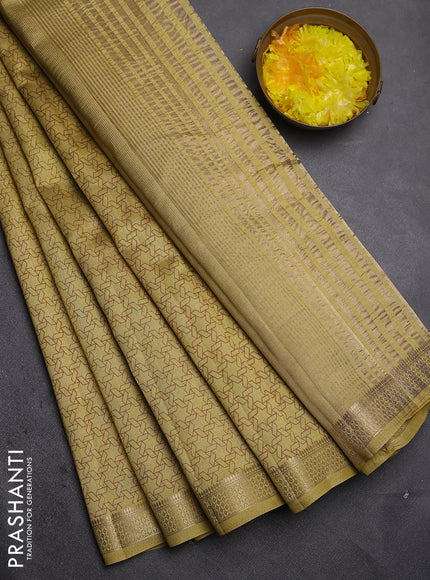 Semi raw silk saree mustard shade with allover geometric prints and zari woven border