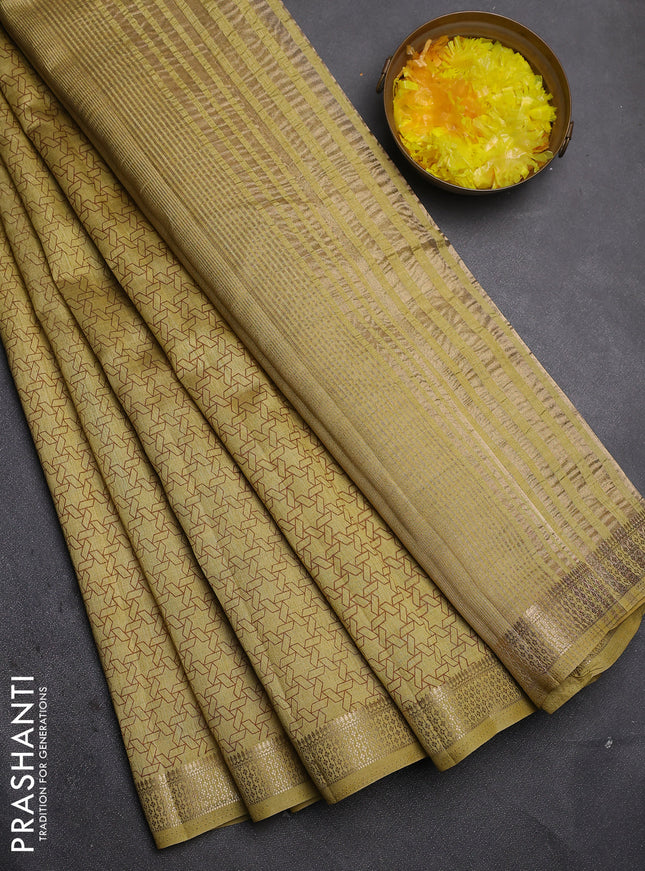 Semi raw silk saree mustard shade with allover geometric prints and zari woven border