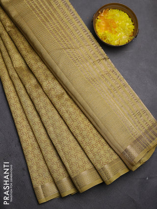 Semi raw silk saree mustard shade with allover geometric prints and zari woven border