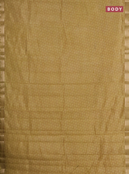 Semi raw silk saree mustard shade with allover geometric prints and zari woven border