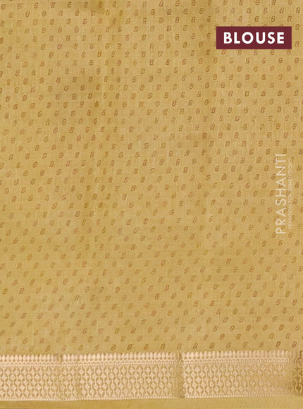 Semi raw silk saree mustard shade with allover geometric prints and zari woven border