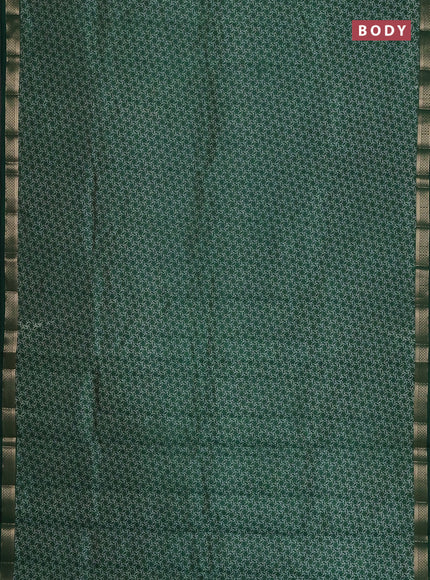 Semi raw silk saree bottle green with allover geometric prints and zari woven border