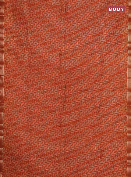 Semi raw silk saree rust shade with allover geometric prints and zari woven border