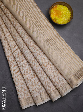 Semi raw silk saree cream with allover geometric prints and zari woven border