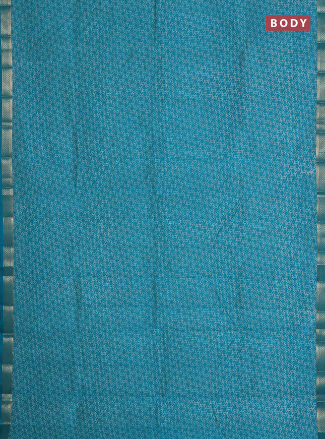 Semi raw silk saree teal blue with allover geometric prints and zari woven border