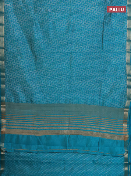 Semi raw silk saree teal blue with allover geometric prints and zari woven border