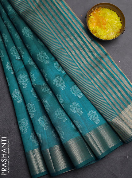 Semi raw silk saree cs blue with allover floral butta prints and zari woven border