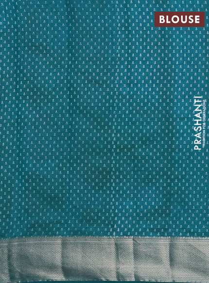 Semi raw silk saree cs blue with allover floral butta prints and zari woven border