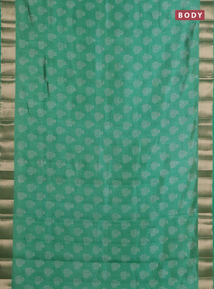 Semi raw silk saree green shade with allover floral butta prints and zari woven border