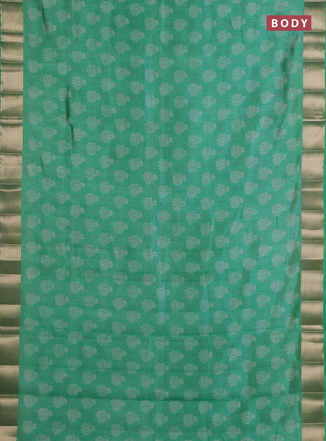 Semi raw silk saree green shade with allover floral butta prints and zari woven border