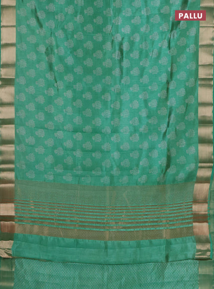 Semi raw silk saree green shade with allover floral butta prints and zari woven border