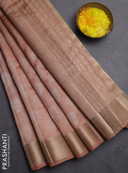 Semi raw silk saree pastel peach with allover floral butta prints and zari woven border