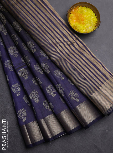 Semi raw silk saree navy blue with allover floral butta prints and zari woven border