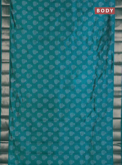 Semi raw silk saree teal blue with allover floral butta prints and zari woven border