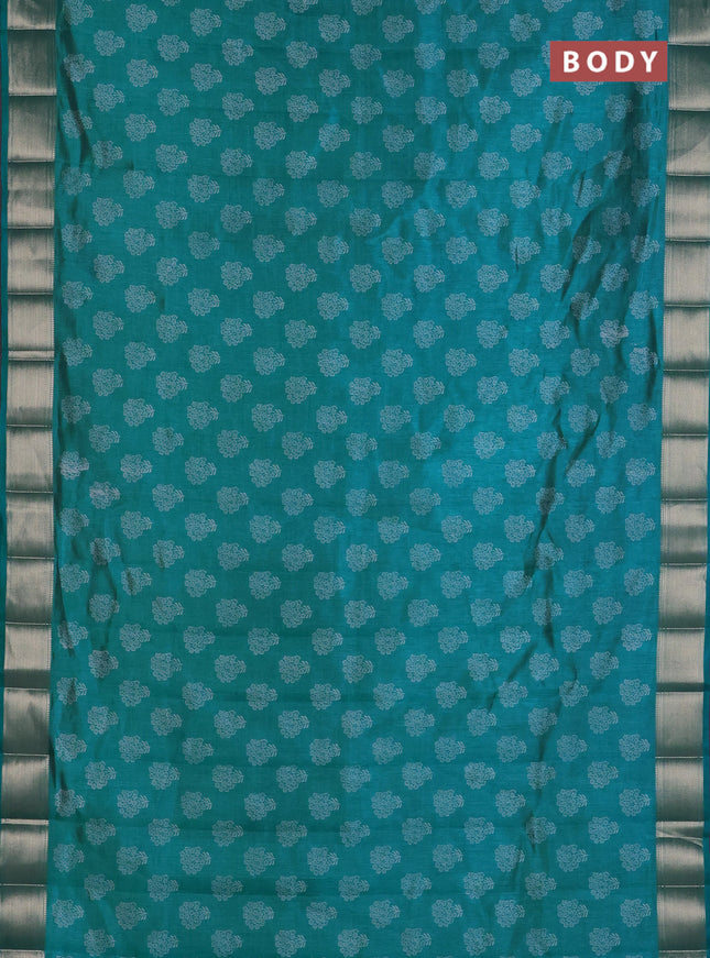 Semi raw silk saree teal blue with allover floral butta prints and zari woven border