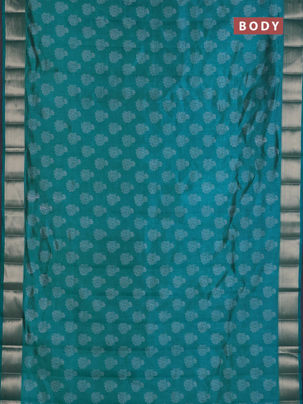 Semi raw silk saree teal blue with allover floral butta prints and zari woven border