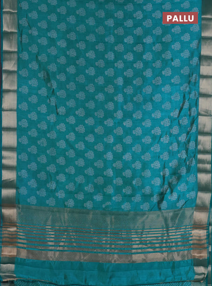 Semi raw silk saree teal blue with allover floral butta prints and zari woven border