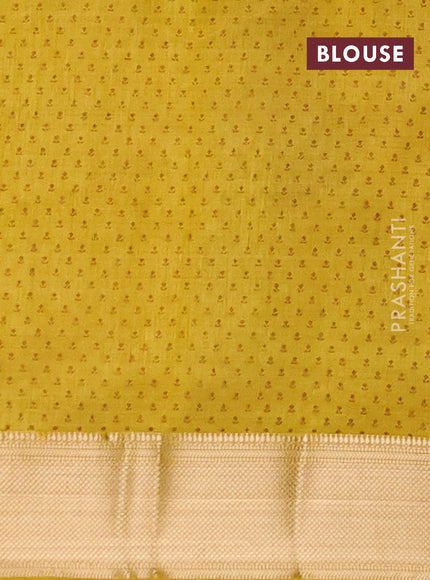 Semi raw silk saree mustard yellow with allover floral butta prints and zari woven border