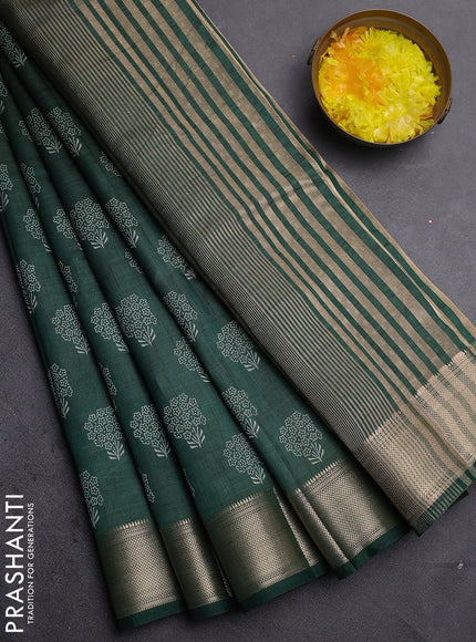 Semi raw silk saree bottle green with allover floral butta prints and zari woven border