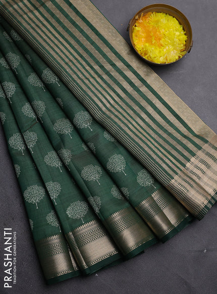 Semi raw silk saree bottle green with allover butta prints and zari woven border