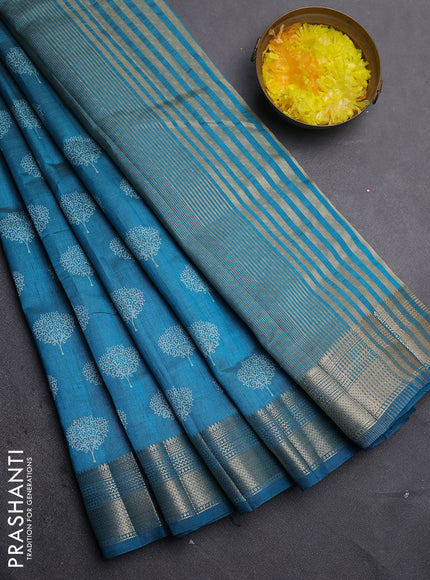 Semi raw silk saree cs blue with allover butta prints and zari woven border