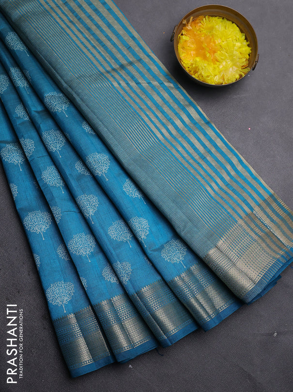 Semi raw silk saree cs blue with allover butta prints and zari woven border