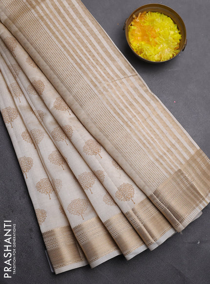 Semi raw silk saree cream with allover butta prints and zari woven border