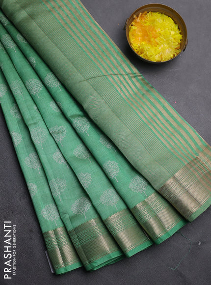 Semi raw silk saree light green with allover butta prints and zari woven border