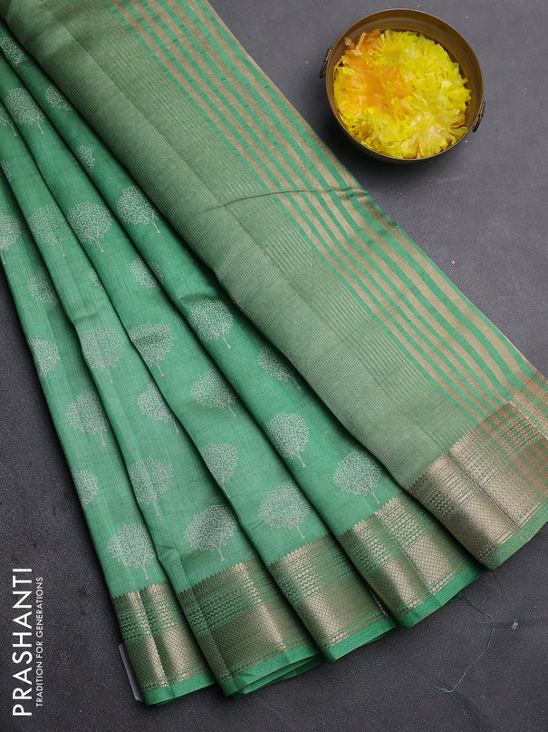 Semi raw silk saree light green with allover butta prints and zari woven border