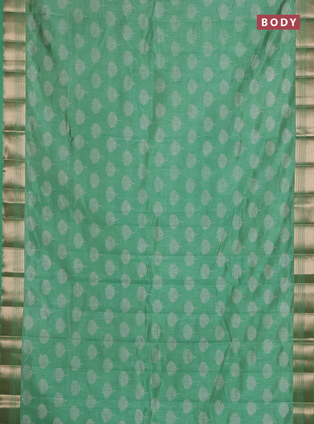 Semi raw silk saree light green with allover butta prints and zari woven border