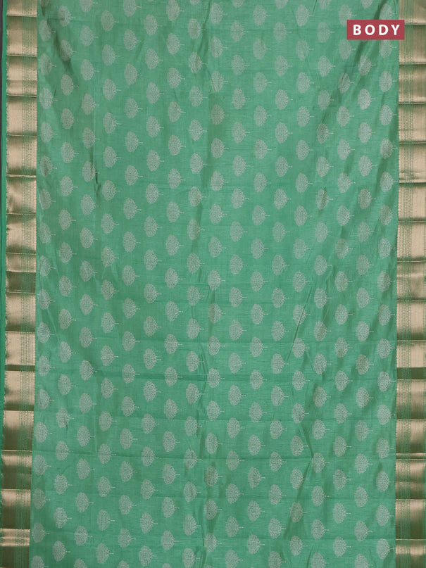 Semi raw silk saree light green with allover butta prints and zari woven border
