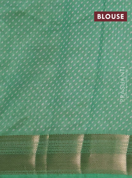 Semi raw silk saree light green with allover butta prints and zari woven border