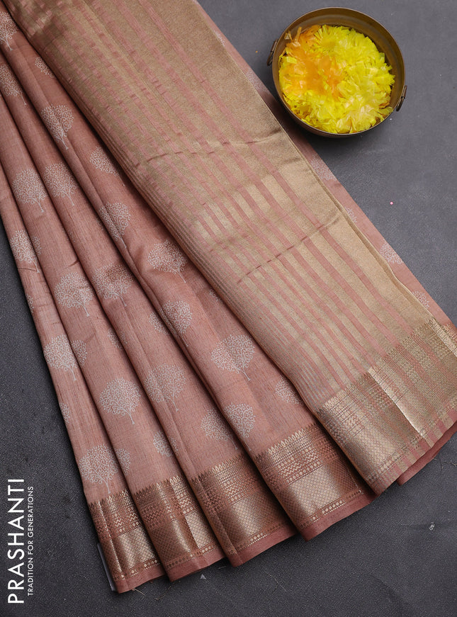 Semi raw silk saree pastel peach with allover butta prints and zari woven border