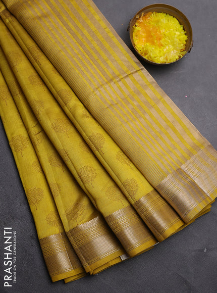Semi raw silk saree lime yellow with allover butta prints and zari woven border