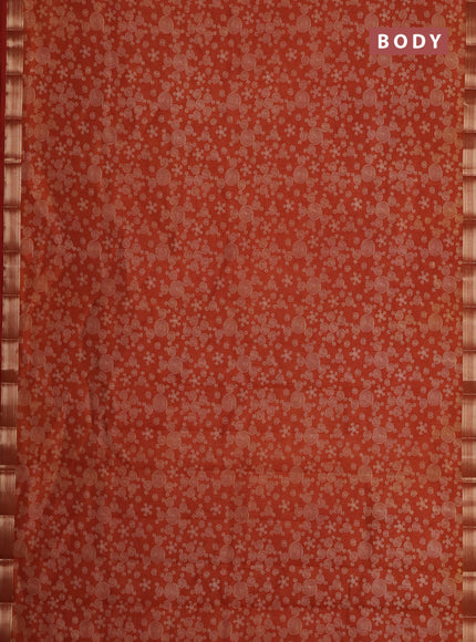 Semi raw silk saree rust shade with allover geometric prints and zari woven border
