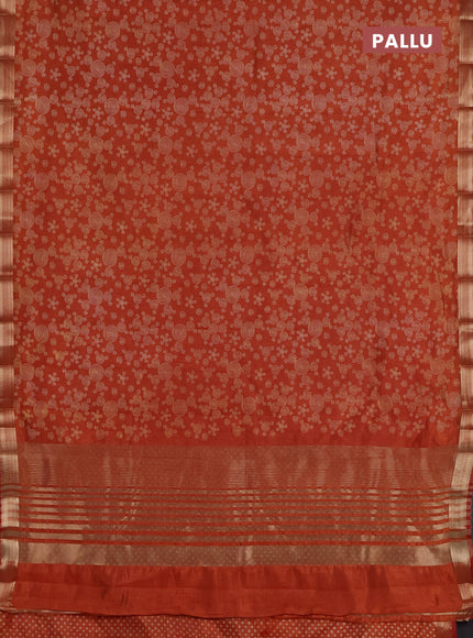Semi raw silk saree rust shade with allover geometric prints and zari woven border
