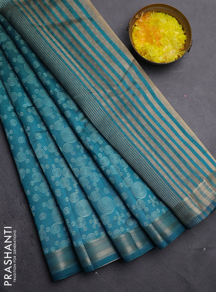 Semi raw silk saree cs blue with allover geometric prints and zari woven border