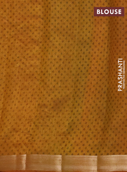 Semi raw silk saree dark mustard with allover geometric prints and zari woven border
