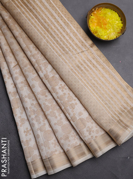 Semi raw silk saree cream with allover geometric prints and zari woven border