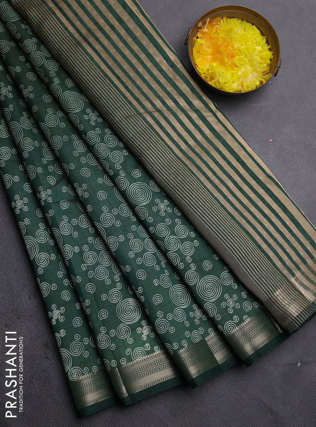 Semi raw silk saree bottle green with allover geometric prints and zari woven border