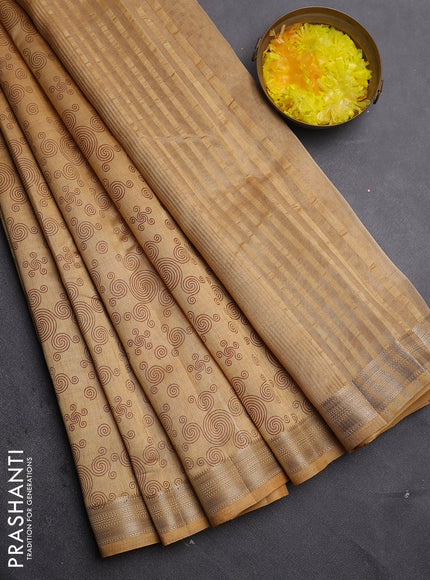 Semi raw silk saree sandal with allover geometric prints and zari woven border