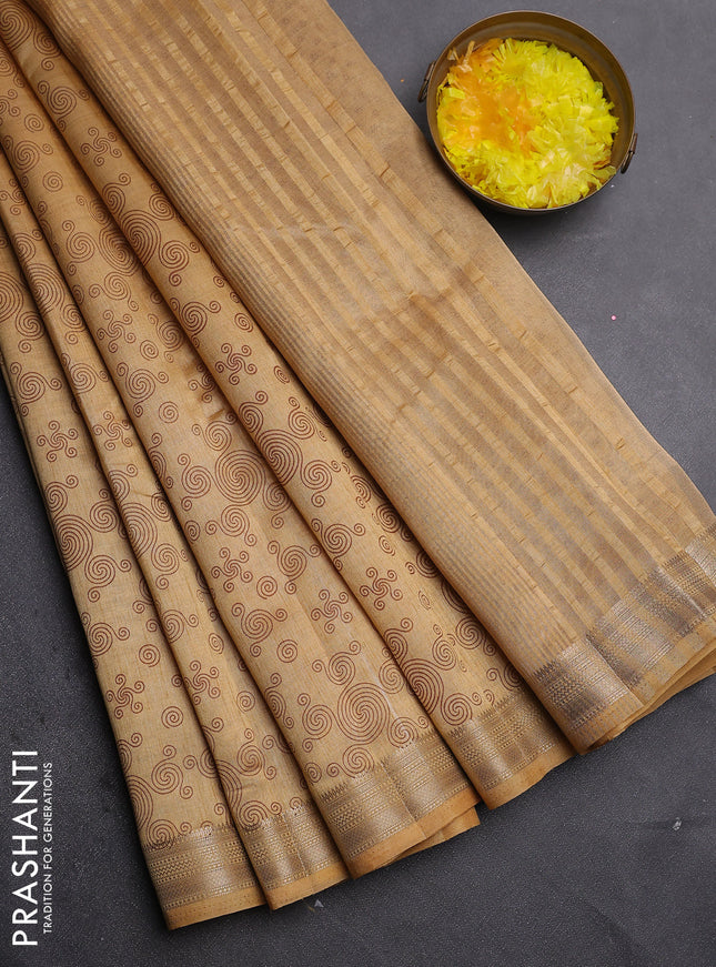 Semi raw silk saree sandal with allover geometric prints and zari woven border