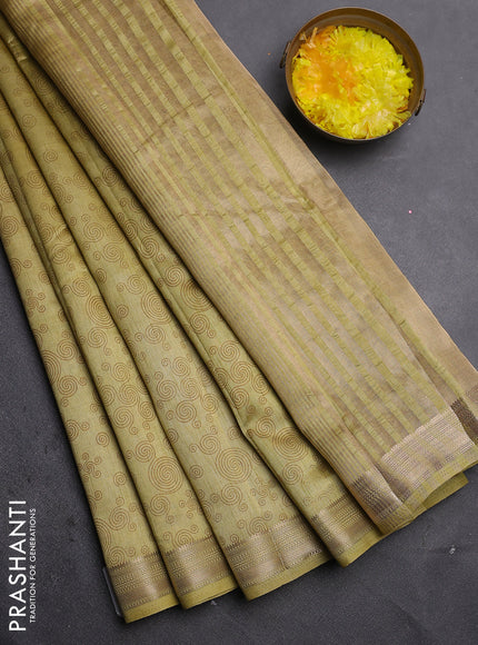Semi raw silk saree mustard shade with allover geometric prints and zari woven border