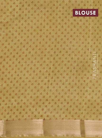 Semi raw silk saree mustard shade with allover geometric prints and zari woven border