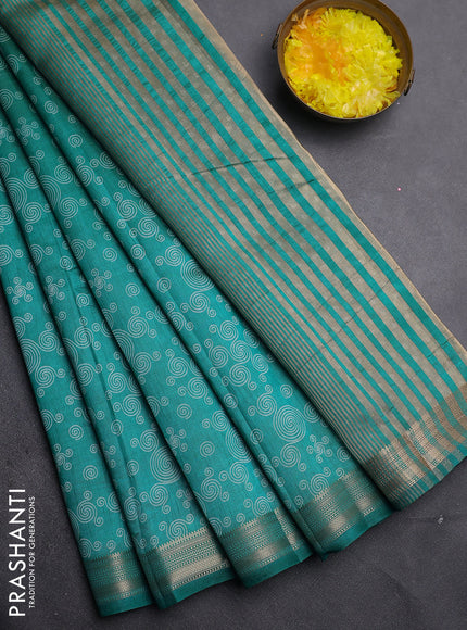 Semi raw silk saree teal green with allover geometric prints and zari woven border