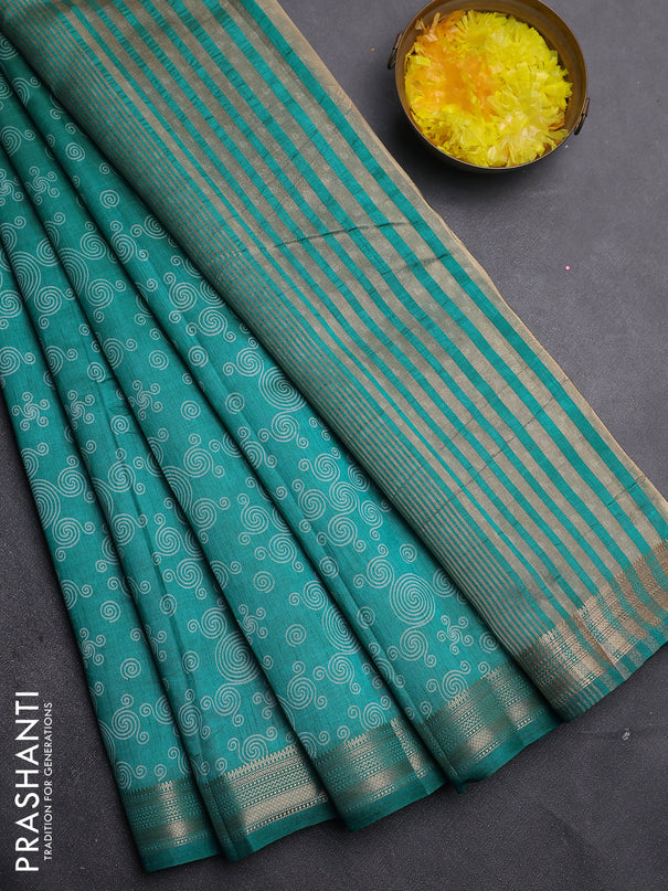 Semi raw silk saree teal green with allover geometric prints and zari woven border