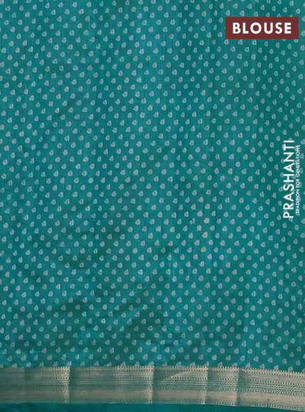 Semi raw silk saree teal green with allover geometric prints and zari woven border