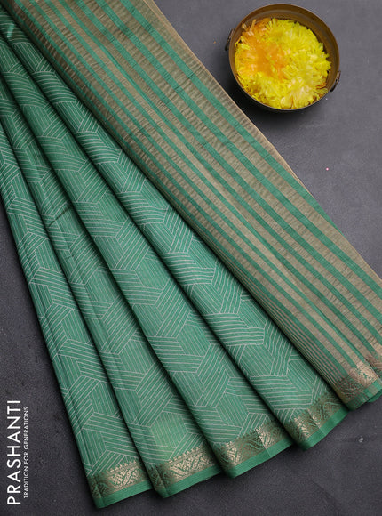 Semi raw silk saree green with allover geometric prints and zari woven border